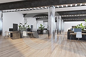 Perspective view on sunny spacious stylish coworking office with wooden floor, metallic columns and dark stone partitions divided