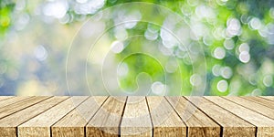 Perspective wood and blur outdoor park nature background, produc photo