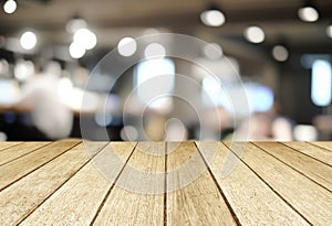 Perspective wood over blurred restaurant with bokeh background