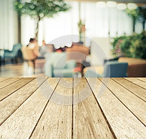 Perspective wood over blurred restaurant with bokeh background,
