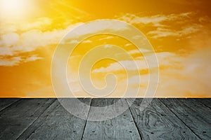 Perspective wooden balcony floor and cloudy sky sunset