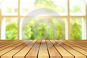 Perspective wooden table on top over blur background view from t