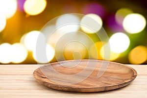 Perspective wooden table on top over blur bokeh light background