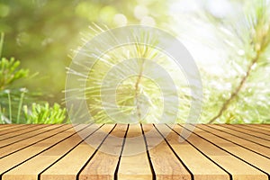 Perspective wooden table on top over blur natural background, ca