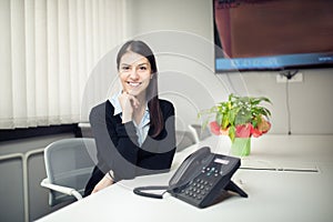 Perspective young female worker business woman day in office.Confident,smart and organized assistant.Managing business photo