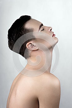 Perspiring male model in profile