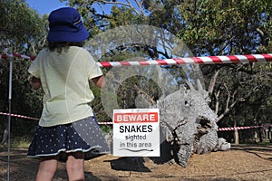 Beware snakes sign in Kings Park in Perth Western Australia