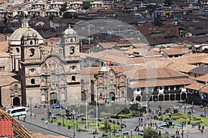 -Peru, city and aerial view of the Plaza de Armas and church with a background of mountains on June 2019