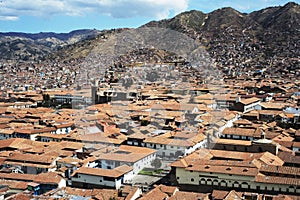 -Peru, city and aerial view of the Plaza de Armas and church with a background of mountains on June 2019