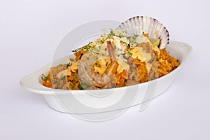 Peru Dish: Rice with Seafood (Arroz con Mariscos), served with a glass of chicha. photo