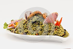 Peru Dish: Seafood green rice made of rice, coriander, seafood, onion, shrimp.