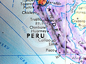 Peru focus macro shot on globe map for travel blogs, social media, website banners and backgrounds.