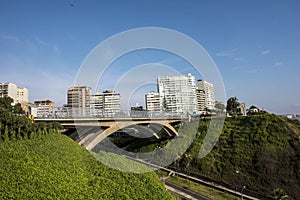 PERU Panoramic view of the Villena Rey Bridge of the Miraflores district with luxurious apartments and Pacific Ocean photo