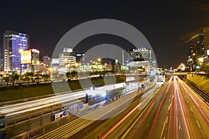 Peru San Isidro, highway-expressway-with modern buildings, banks, corporations and bus stations-metropolitan-at night with night