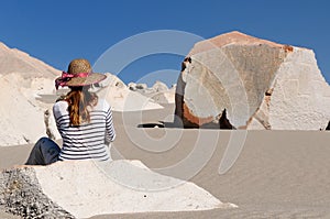 Peru, Tourist on the desert watching Toro Muerto Petroglyphs photo