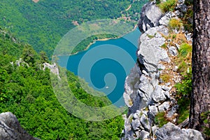 Perucac Lake glistening beneath Banjska Stena viewpoint on majestic Mount Tara