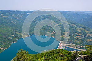 Perucac Lake glistening beneath Banjska Stena viewpoint on majestic Mount Tara