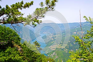 Perucac Lake glistening beneath Banjska Stena viewpoint on majestic Mount Tara