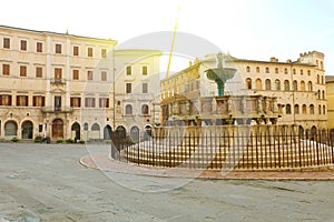 Perugia city with Piazza IV Novembre square with monumental fountain Fontana Maggiore at sunrise, Umbria, Italy