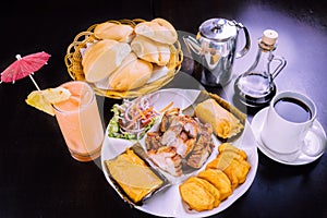 Peruvian food breakfast tamales con chicharron