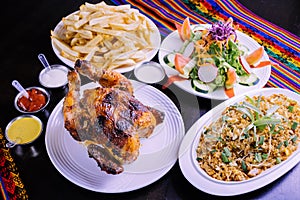 Peruvian food: Pollo a la brasa con arroz chaufa photo