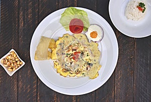 Peruvian food, `tortilla de mariscos` seafood omelette photo