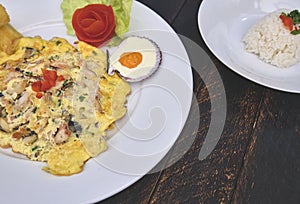 Peruvian food, `tortilla de mariscos` seafood omelette photo