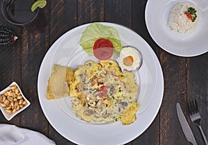Peruvian food, `tortilla de mariscos` seafood omelette photo