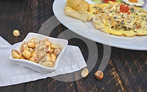 Peruvian food, `tortilla de mariscos` seafood omelette photo