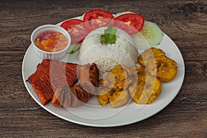 Peruvian jungle gastronomy. Chorizo, fried banana and rice