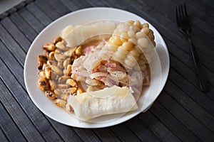 Peruvian traditional dish.fish ceviche with yuka and corn