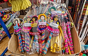 Peruvian traditional wares and dolls for sale in Ollantaytambo,