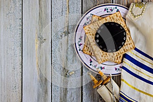 Pesach Passover symbols of great Jewish holiday traditional matzah, seder, kippah and tallit, torah scroll