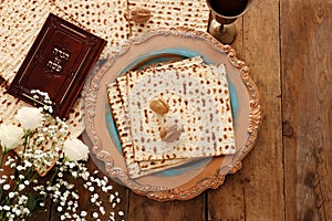 Pesah celebration concept jewish Passover holiday. Traditional book with text in hebrew: Passover Haggadah Passover Tale