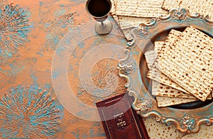 Pesah celebration concept jewish Passover holiday. Traditional book with text in hebrew: Passover Haggadah Passover Tale