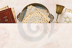 Pesah celebration concept jewish Passover holiday. Traditional book with text in hebrew: Passover Haggadah Passover Tale