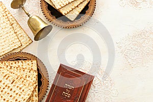 Pesah celebration concept jewish Passover holiday. Traditional book with text in hebrew: Passover Haggadah Passover Tale