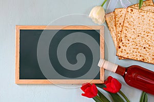 Pesah celebration concept (jewish Passover holiday) with wine and matza