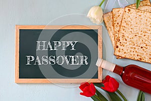 Pesah celebration concept (jewish Passover holiday) with wine and matza