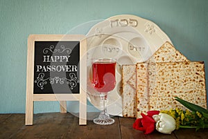 Pesah celebration concept (jewish Passover holiday) with wine and matza