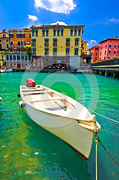 Peschiera del Garda colorful harbor and boats vertical view