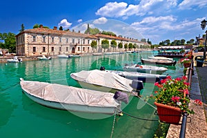 Peschiera del Garda colorful harbor and boats view