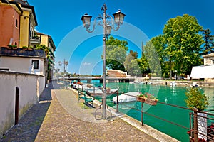 Peschiera del Garda colorful harbor and boats view