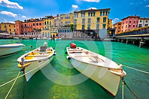 Peschiera del Garda colorful harbor and boats view