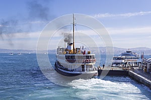 Pessenger ship on pier at Istanbul bosphorus sea