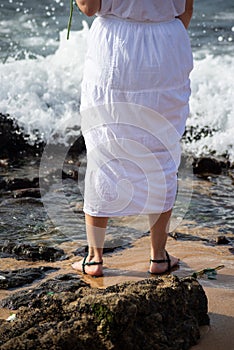 Pessoa, a fan of candomble, is seen on the beachfront paying homage to iemanja on Rio Vermelho beach, in the city of Salvador,