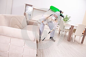 Pest control contractor working in the flat