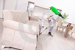 The pest control contractor working in the flat