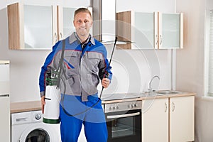 Pest Control Worker With Insecticide Sprayer photo