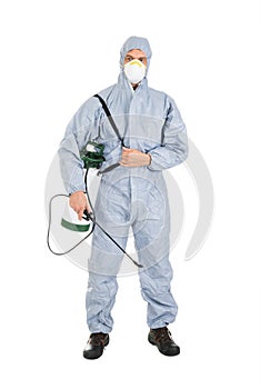 Pest control worker with pesticides sprayer